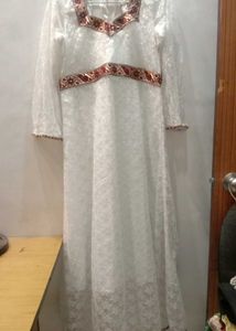 Elegant White Lace Gown with Red Trim