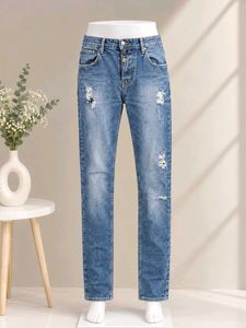 Distressed Blue Denim Jeans