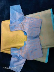 Elegant Yellow Saree with Blue Blouse Piece