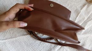 Chic Brown Handbag with Gold Logo