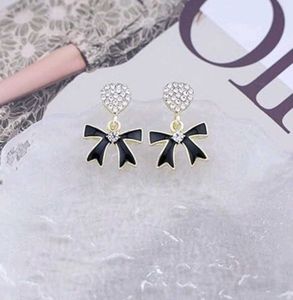 Korean Black Bow Studded Heart Earrings