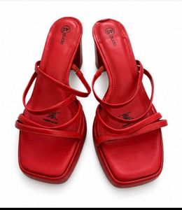 Unused red heels