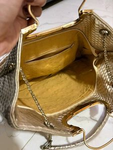 Elegant Gold Embellished Handbag