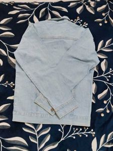 Light Blue Denim Jacket with Unique Trim
