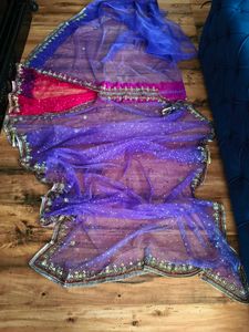 Stunning handwork Net lehanga Saree