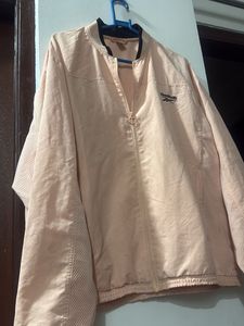Reebok light orange gym wear Jacket