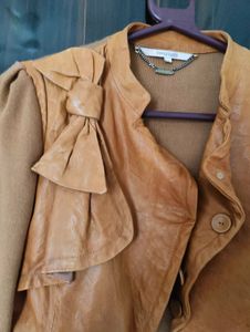 Knit Jacket with a burn mark