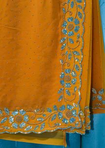 Vibrant laddu yellow colour Diamond Work saree