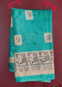Elegant Teal Silk Saree with Unique Print