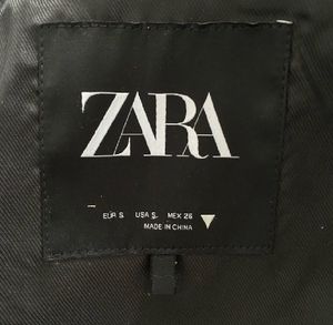 Zara gathered blazer with slit arm.