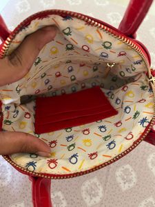 glossy red mini handbag