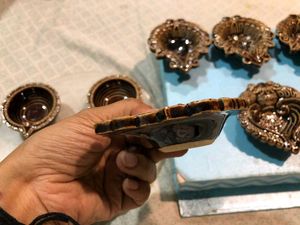 Set of New 9 ceramic designer diyas together.