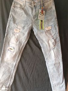 Light Wash Distressed Denim Jeans
