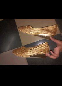 Golden Jutti with stone work