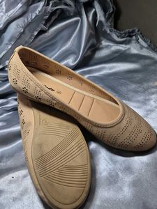 Women's Tan Perforated Ballet Flats