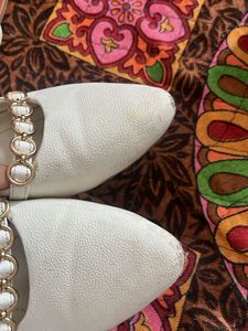 Elegant White Ballerinas with Chain Detail