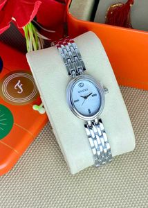 Gucci Gold &amp; Green Watch