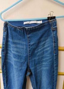 Trendy Flared Jeans with Ripped Knees