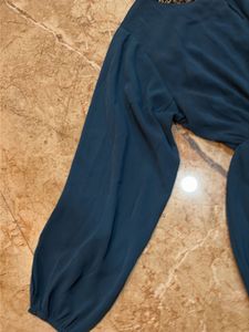Elegant Teal Dress with Embellished Neckline