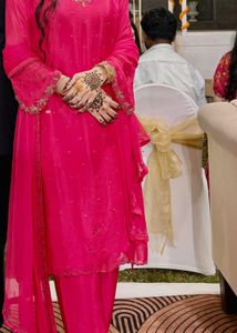 reduced price hot pink suit with handwork done