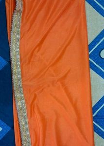 Sparkling Orange Saree with Golden Border ✨