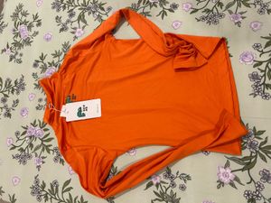 Orange Turtleneck Graphic Top