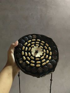 Unique Round Woven Bag with Coconut Shells