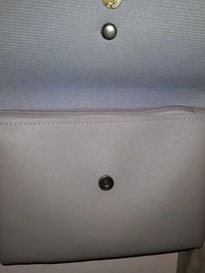 Grey Bow Detail Crossbody Bag with Pom Po