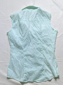 Light Blue Sleeveless Collared Shirt