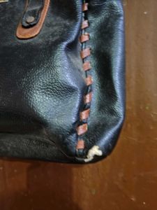 Black Leather Handbag with Brown Accents