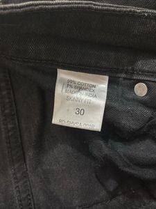 Faded black jeans