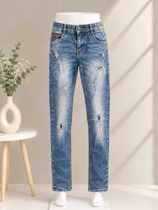 Distressed Blue Denim Jeans