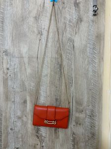 Vibrant Orange Clutch with Gold Hardware