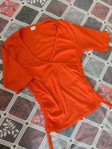 Coral Ribbed V-Neck Ruched Top