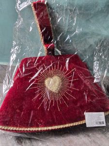 Elegant Red Velvet Clutch with Heart Design
