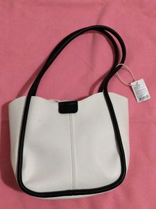 Chic White Tote Bag with Black Trim
