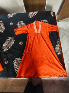 Vibrant Orange Kurta Set with White Embroidery