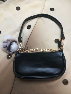 Chic Black Waist Bag with Gold Chain