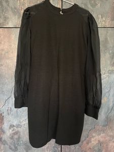 Chic Black Dress with Sheer Sleeves