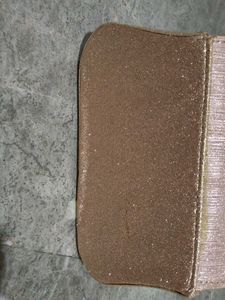 purse in rose Golden colour.