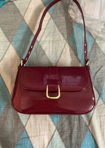 burgundy handbag