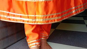 Vibrant Orange Kurta Set with Golden Accents