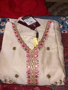 Elegant Cream Lehenga Choli with Floral Embroidery