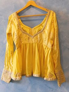 Yellow Embroidered Peplum Blouse