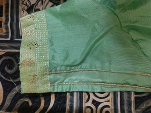 Elegant Teal Saree with Gold Stripes