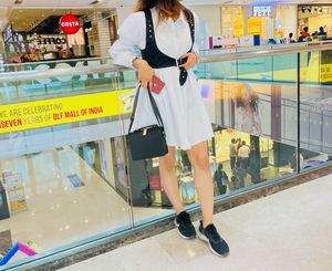 Chic White Shirt Dress with Black Harness