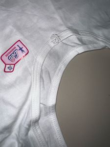 Cute White Camisole with Flower Detail