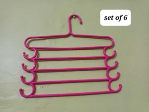 Set of 6 Pink Multi-Tier Hangers.