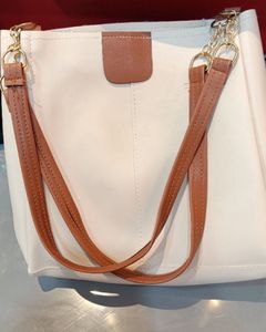 Chic Cream Tote Bag with Gold Chain Accents