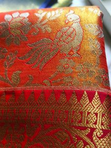 Beautiful parrot theme Brocade orange silk